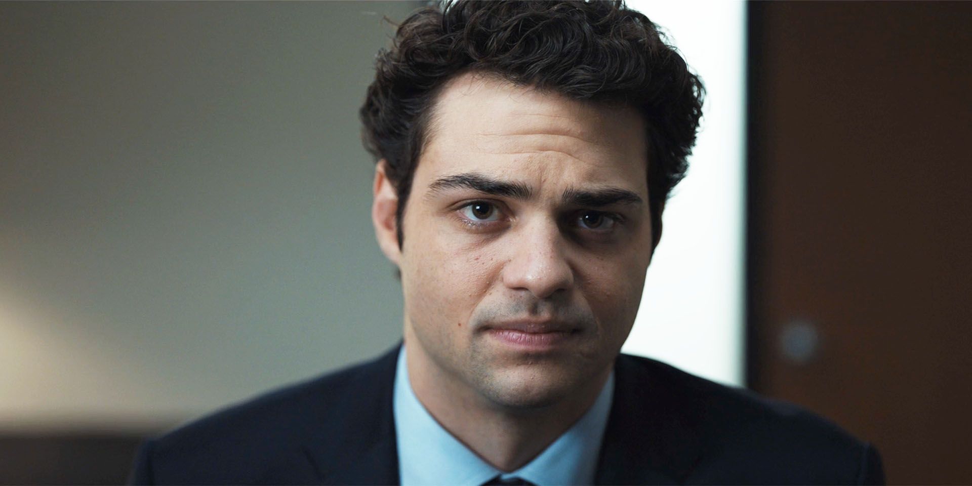 Noah Centineo as Owen in The Recruit season 2, episode 2, talking to someone and looking disappointed