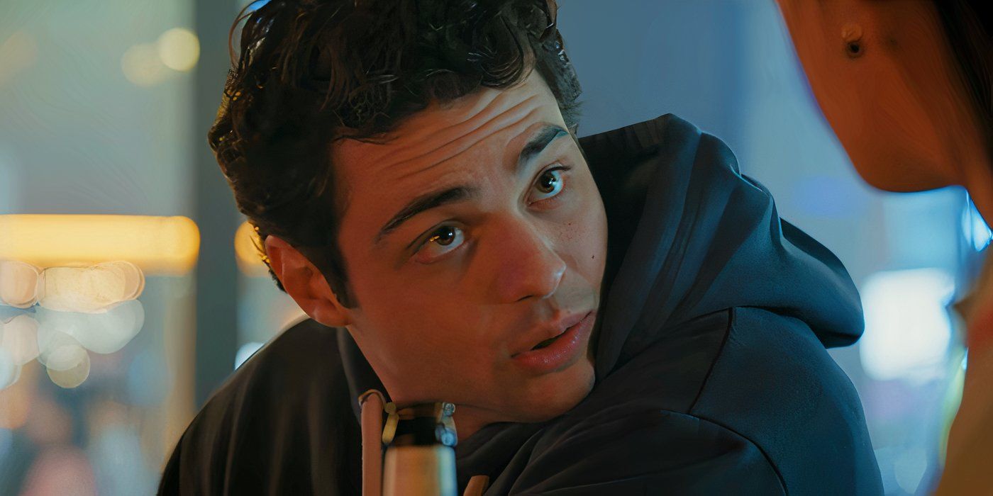 Noah Centineo looking intrigued at a bar in The Recruit season 2