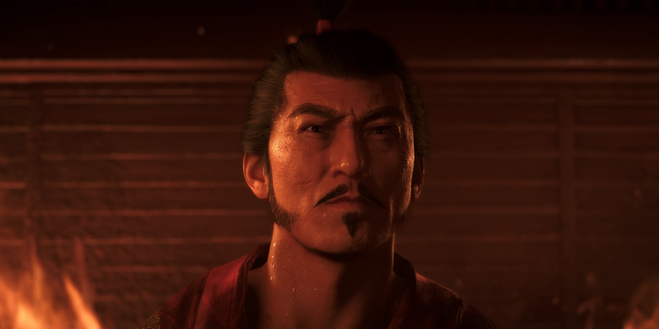 Nobunaga surrounded by flames in Assassin&rsquo;s Creed Shadows
