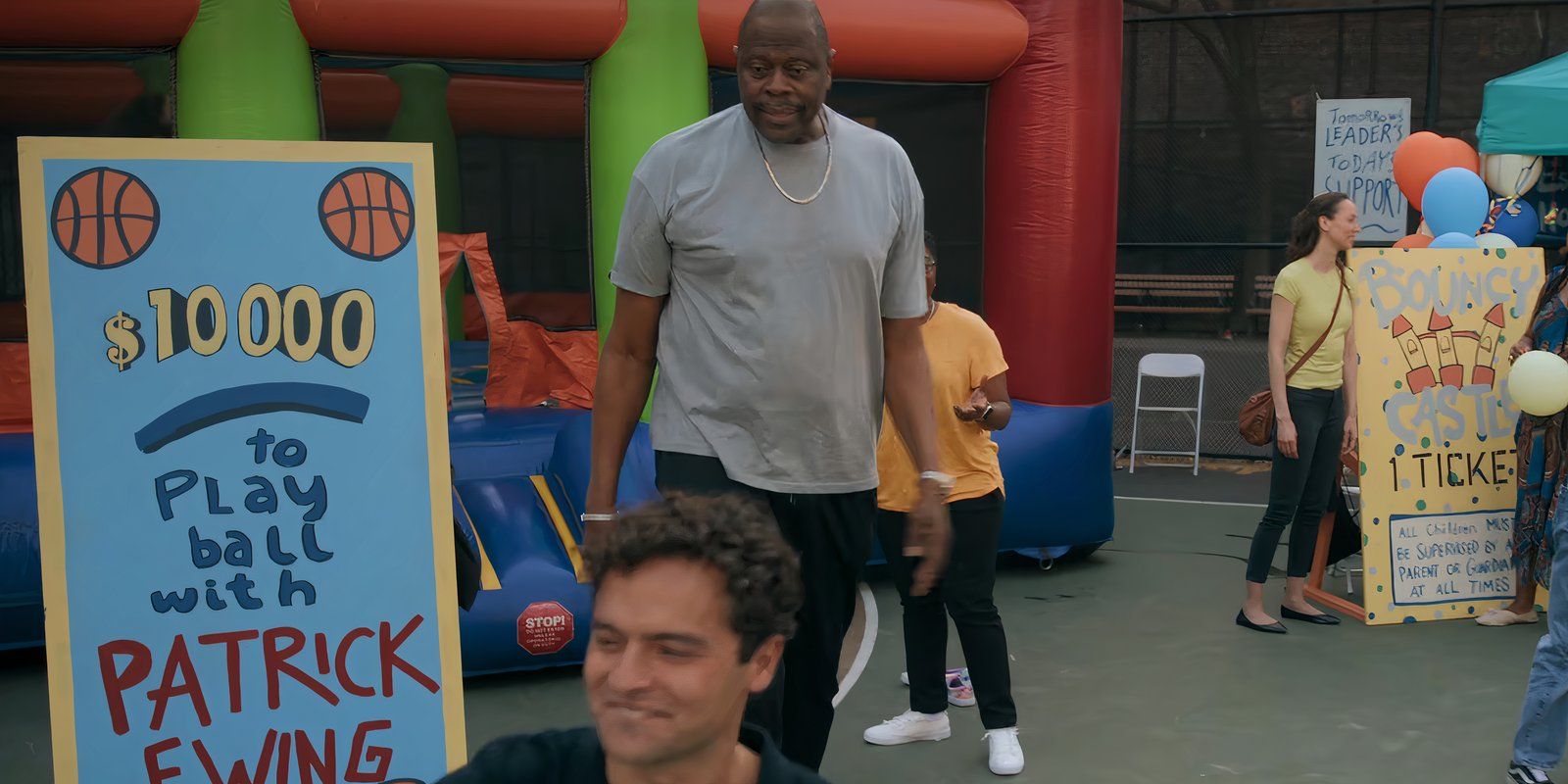 Patrick Ewing stands in a benefit in The Life List