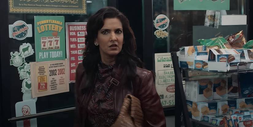 Poorna Jagannathan as Lucky standing at the door looking disturbed on Deli Boys