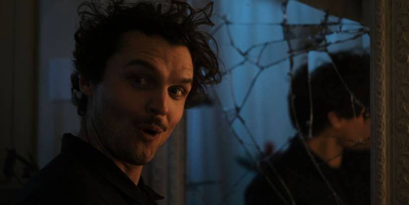 Ray Nicholson looking back from a broken mirror in Borderline