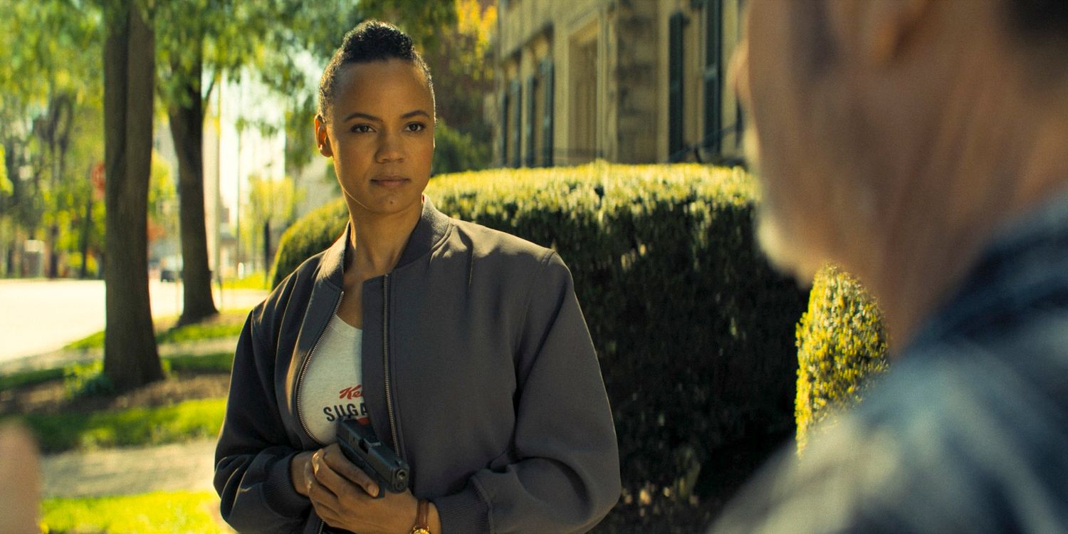 Frances Neagley (Maria Sten) discreetly pointing a gun in Reacher Season 3 Ep 7