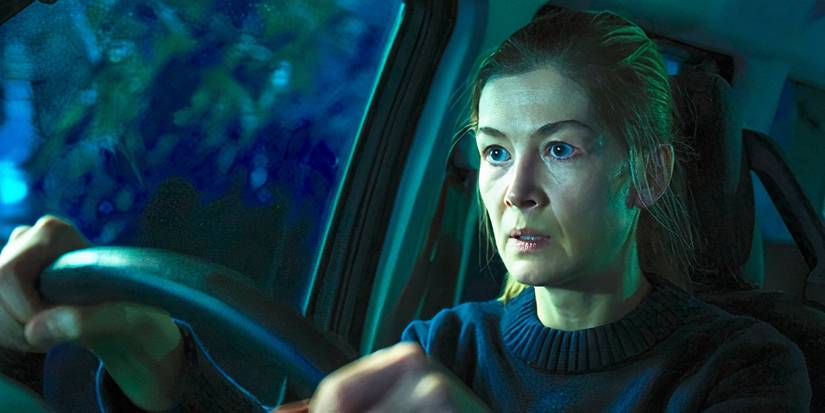 Rosamund Pike drives her car in Hallow Road