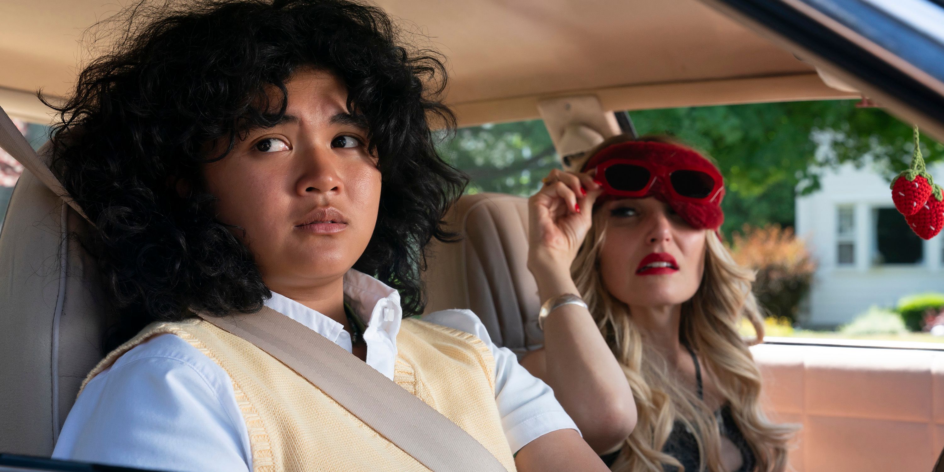 Sam Morelos & Chloe Fineman in a car in Summer of 69