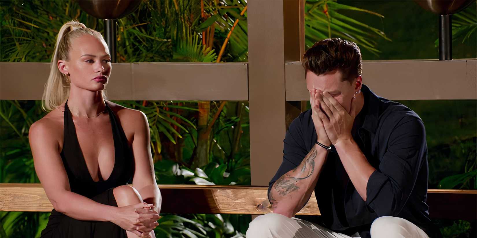 Ashley looking at Grant cry into his hands during the last bonfire