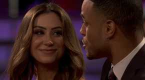 A close up of Juliana Pasquarosa smiling at Grant Ellis on The Bachelor