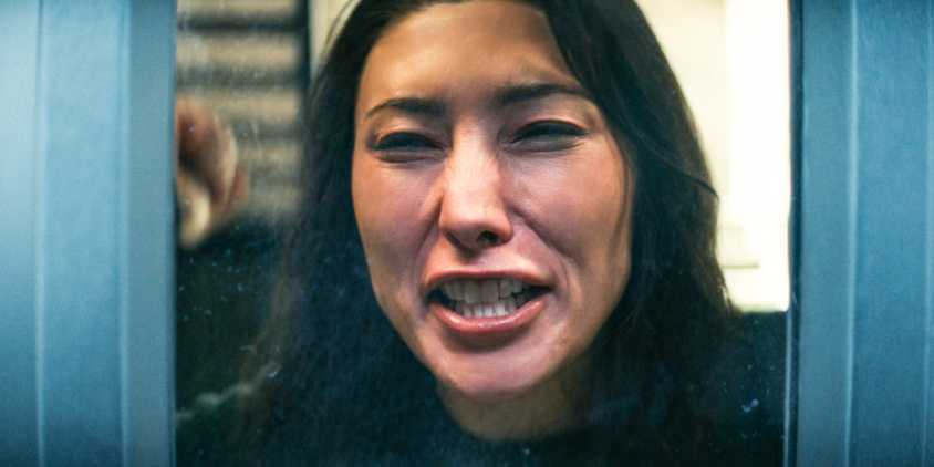 Gemma (Dichen Lachman) crying in pain as she watches Mark walk away from her in Severance Season 2 Ep 10