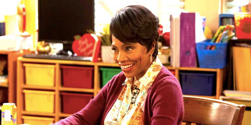 Sheryl Lee Ralph's Barbara smiles at her desk in Abbott Elementary