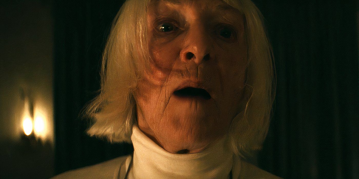 Sissy Cobel speaking to Harmony Cobel by firelight in Severance season 2, episode 8 (2025)