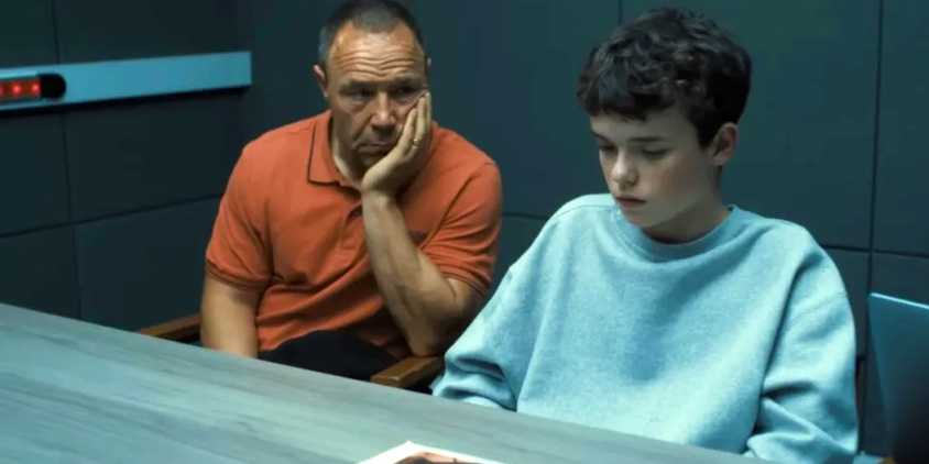Stephen Graham (Eddie) and Owen Cooper together (Jamie) in a police interview room in Adolescence.
