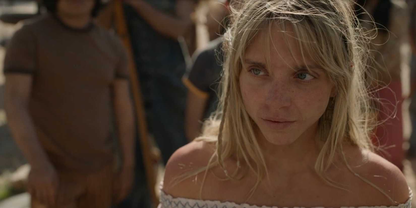 Suzanne (Casimere Jollette) looking uneasy in front of a group of farmers in Dark Winds season 3, episode 3