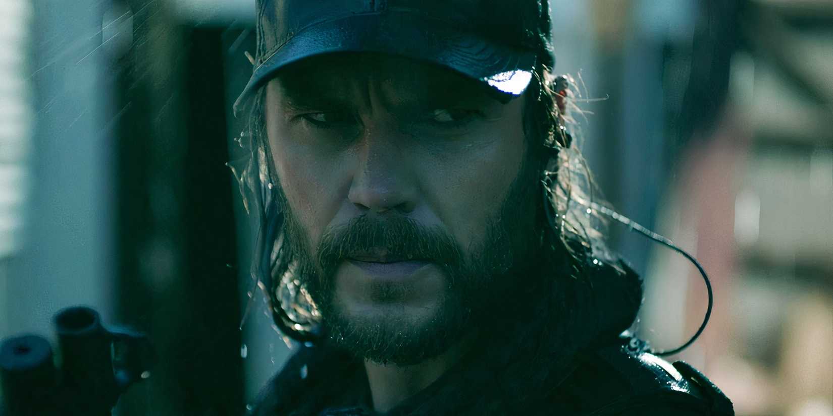Taylor Kitsch holding a shotgun as Ben Edwards in The Terminal List season 1