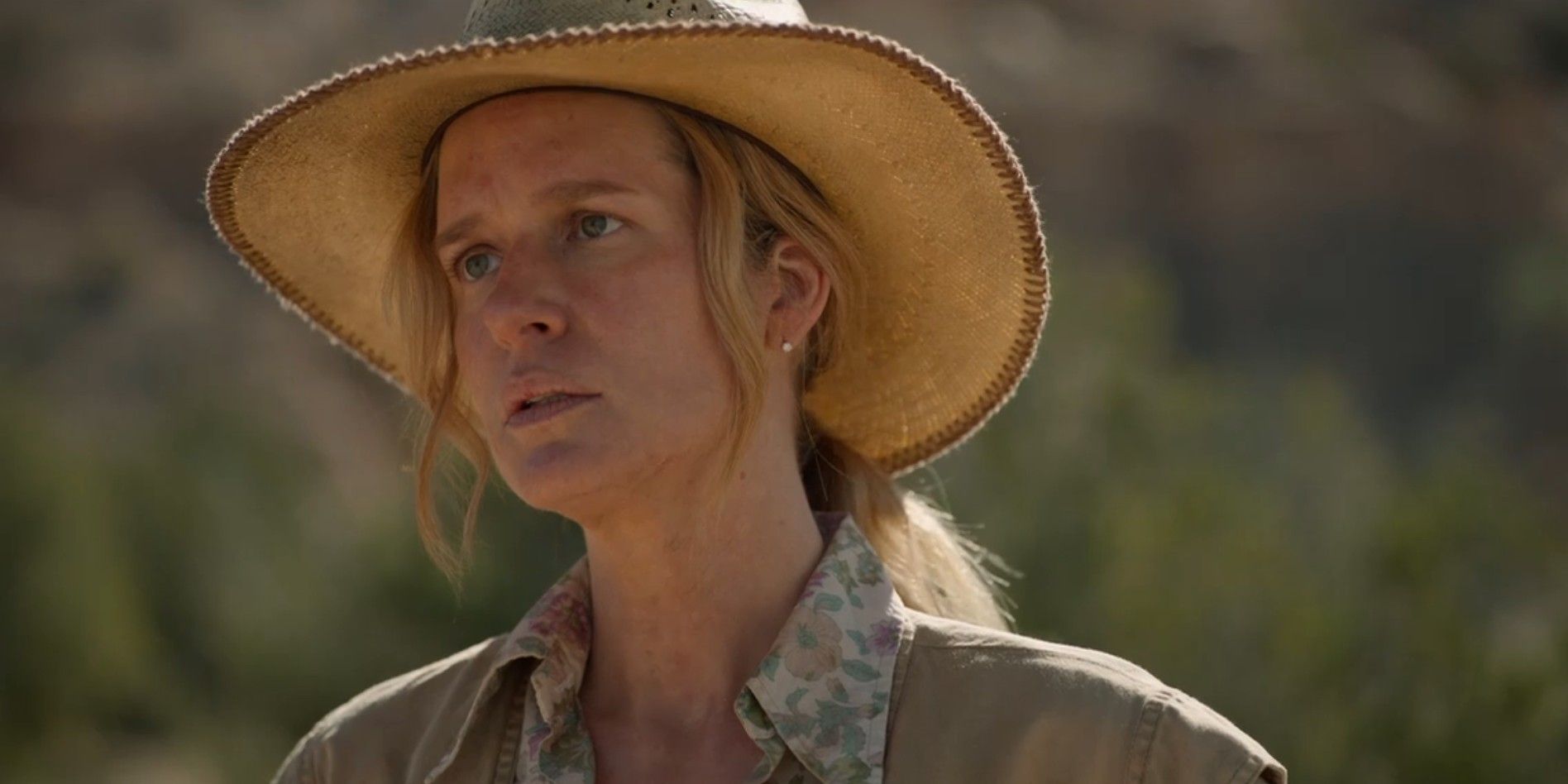 Teddi Issacs (Carly Roland) looking distraught in a sun hat in Dark Winds season 3, episode 2