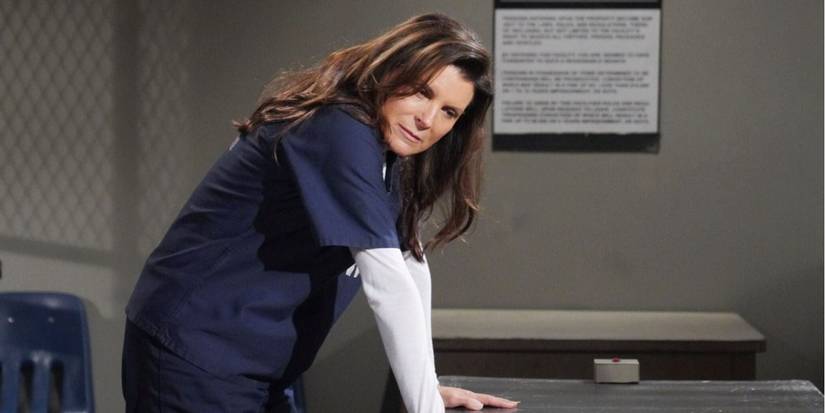 The Bold and the Beautiful sheila in jail leaning over table