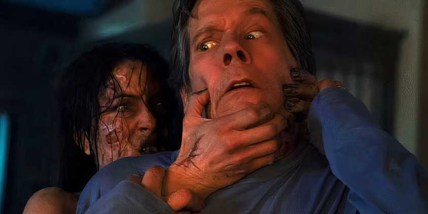 A demon grabs Kevin Bacon's Hub Halloran from behind in The Bondsman
