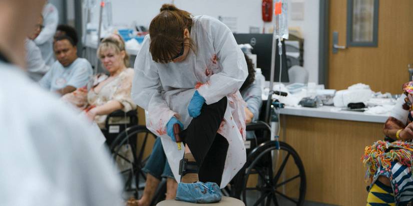 Dr. McKay (Fiona Dourif) drilling into her ankle monitor in The Pitt Season 1 Ep 13
