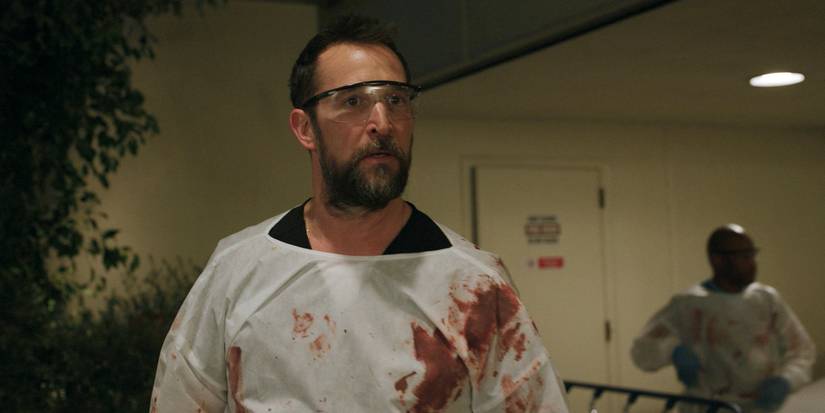 Dr. Robi (Noah Wyle) covered in blood, looking tense in The Pitt Season 1 Ep 13
