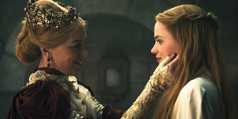 Queen Morgase (Olivia Williams) lovingly touching Elayne's (Ceara Coveney) face in The Wheel of Time Season 3 Ep 2
