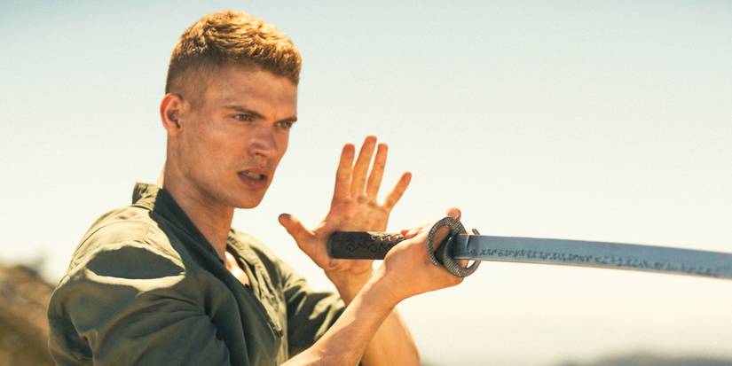 Rand al'Thor (Josha Stradowski) training with his katana in The Wheel of Time Season 3 Ep 2