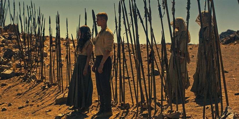 Moiraine Damodred (Rosamund Pike) and Rand al'Thor (Josha Stradowski) ready to set off on their mission in The Wheel of Time Season 3 Ep 4