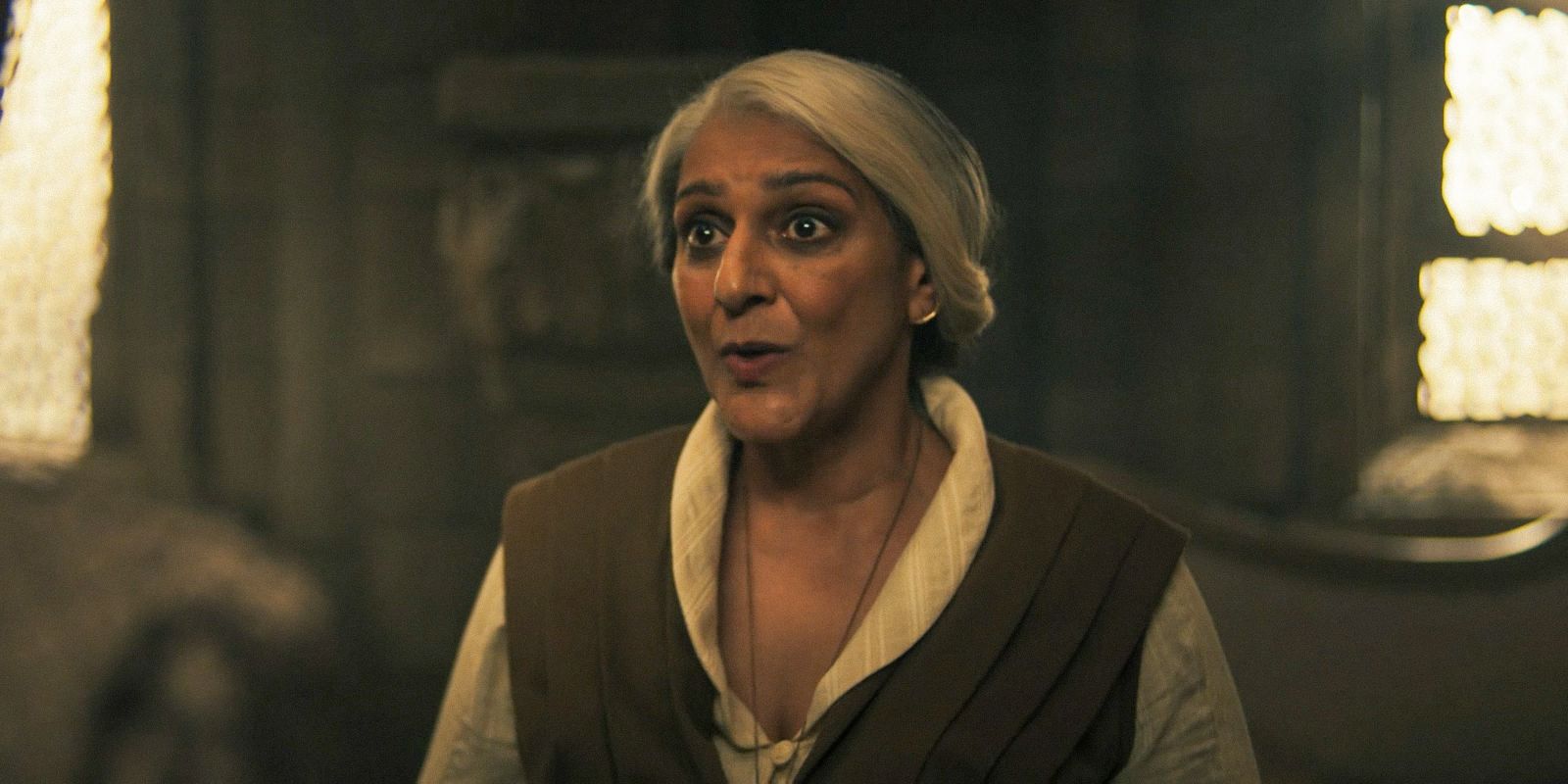 Verin Mathwin (Meera Syal) explaining something, looking concerned in The Wheel of Time Season 3 Ep 5