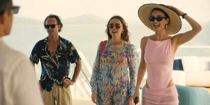 Chloe (Charlotte Le Bon) happy that Chelsea (Aimee Lou Wood) and Rick (Walton Goggins) joined the yacht ride in The White Lotus Season 3 Ep 4
