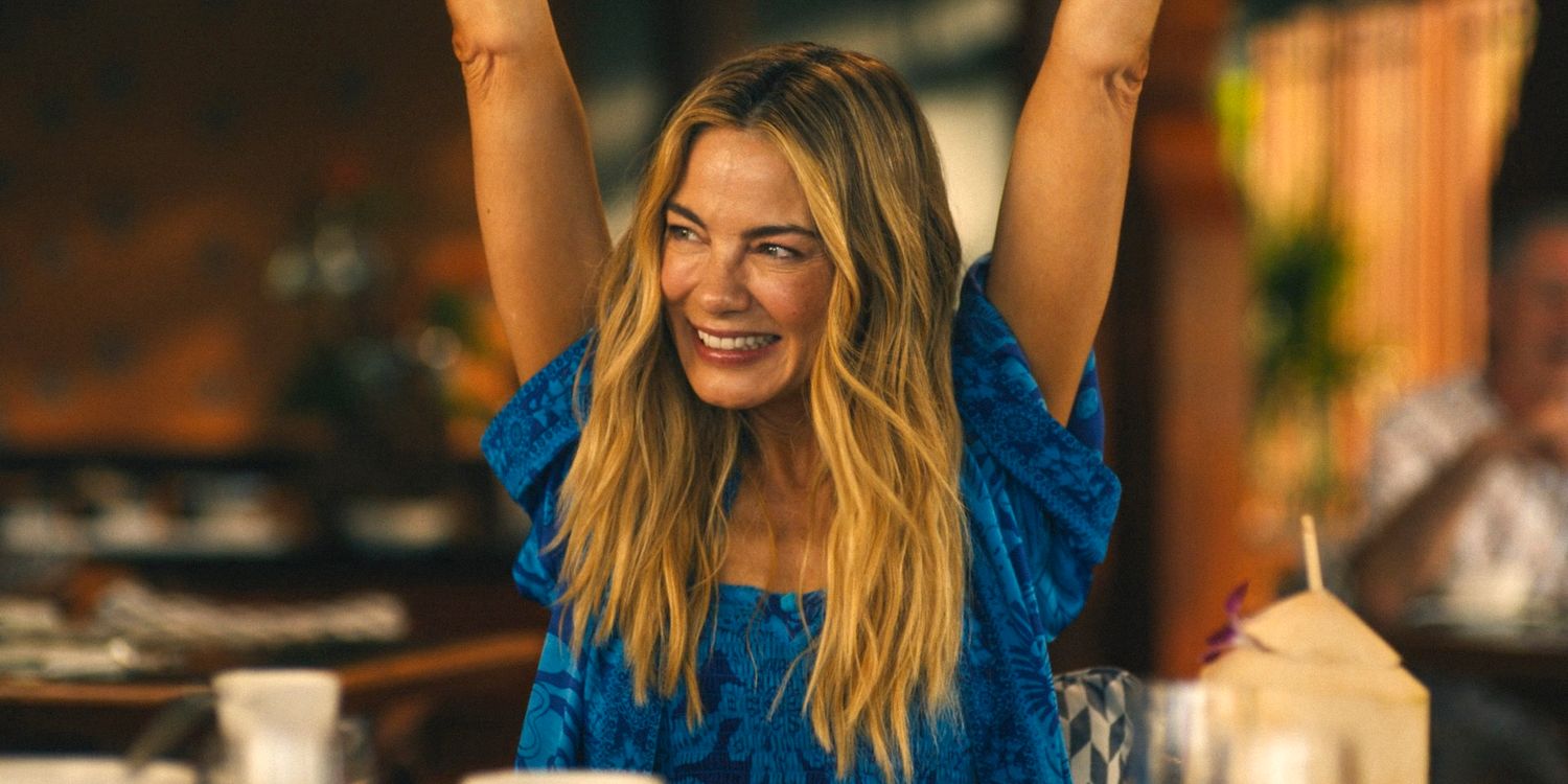 Jaclyn (Michelle Monaghan) raising her arms in joy in The White Lotus Season 3 Ep 4