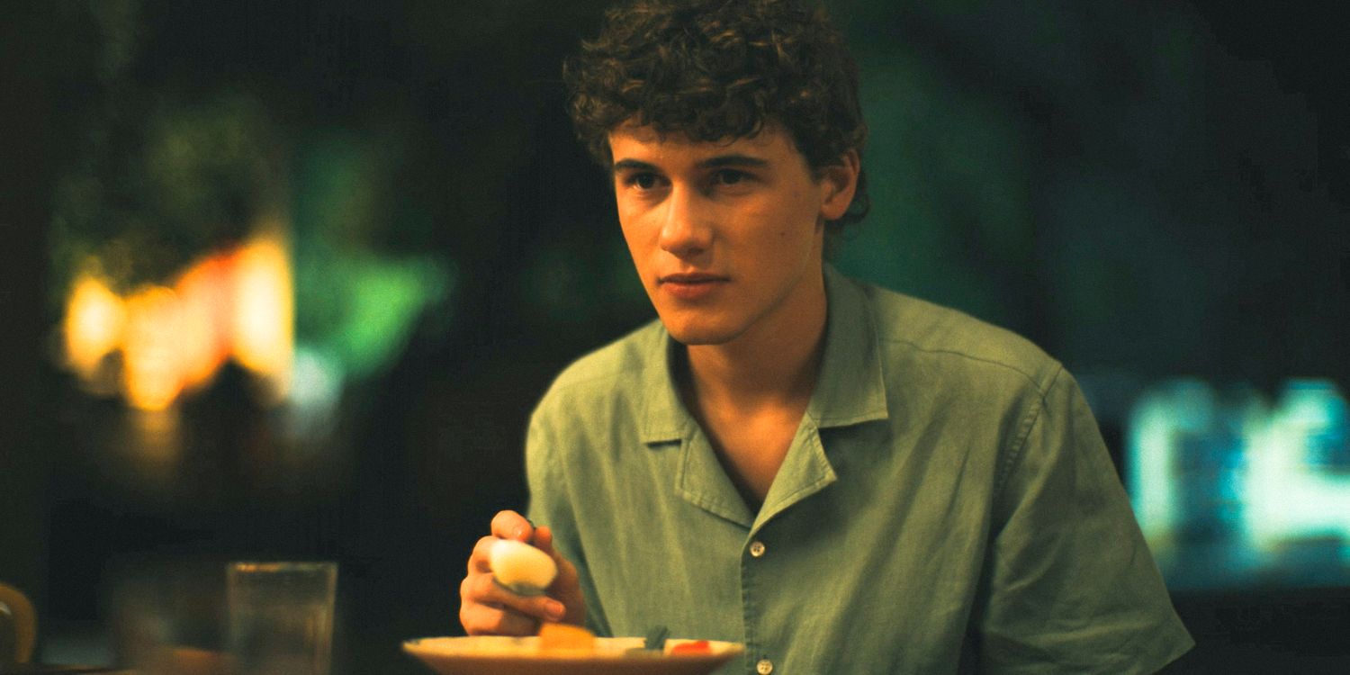 Lochlan (Sam Nivola) having dinner at the monastery in The White Lotus Season 3 Ep 7