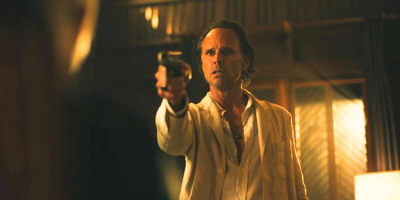 Rick (Walton Goggins) pointing a gun at Jim in The White Lotus Season 3 Ep 7
