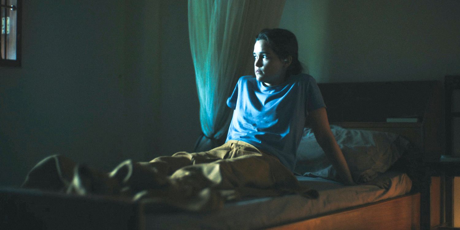 Piper (Sarah Catherine Hook) lying awake, deep in thought, in her monastery room in The White Lotus Season 3 Ep 7