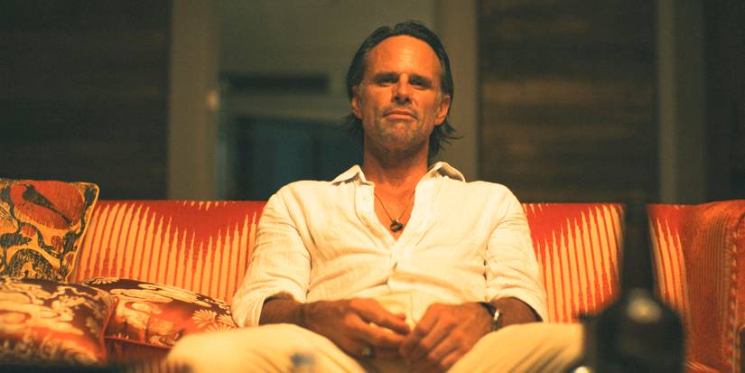 Rick (Walton Goggins) casually lounging on a sofa in The White Lotus Season 3 Ep 7