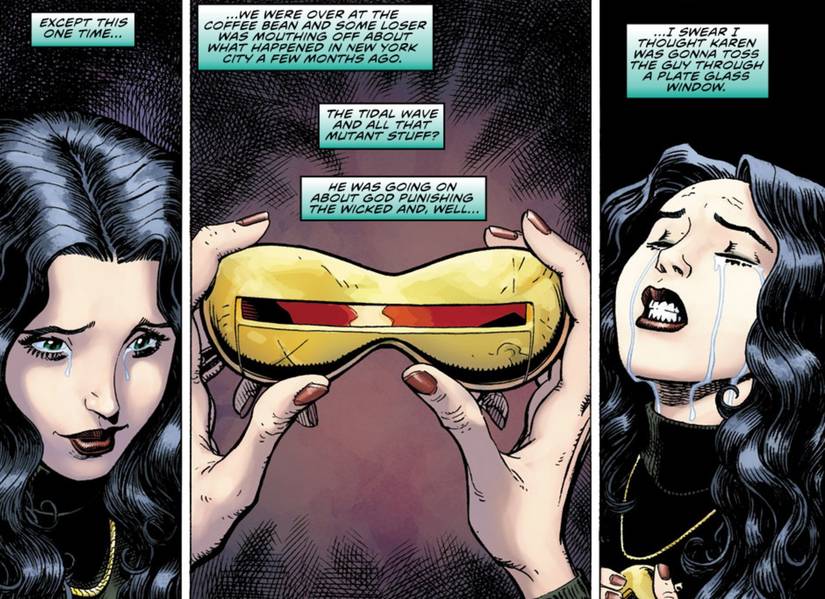 Ultimate Comics X #2 Jean Grey cries as she holds Cyclops' goggles and reminisces about him