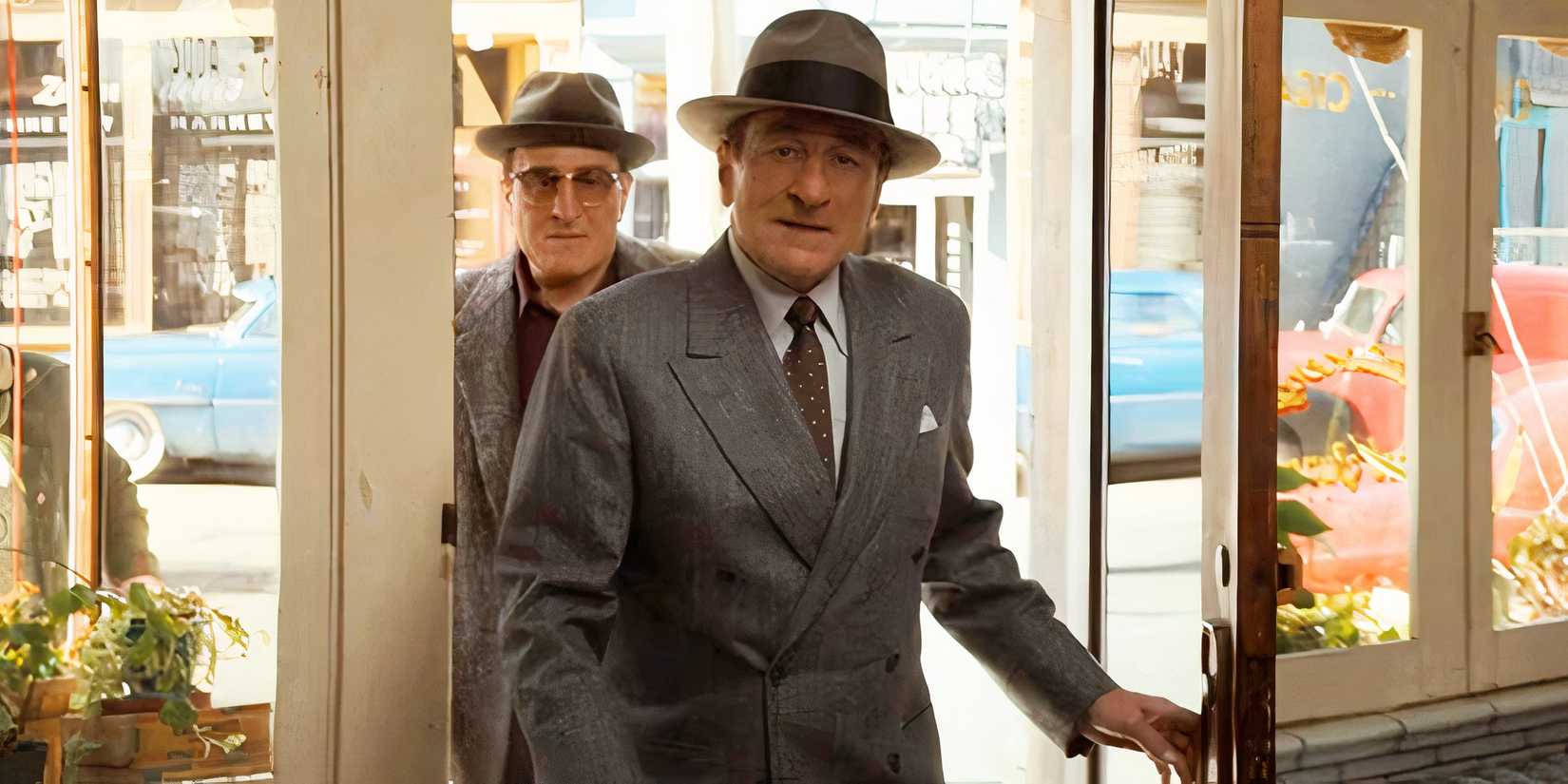 Robert De Niro entering a room as a mob boss in The Alto Knights