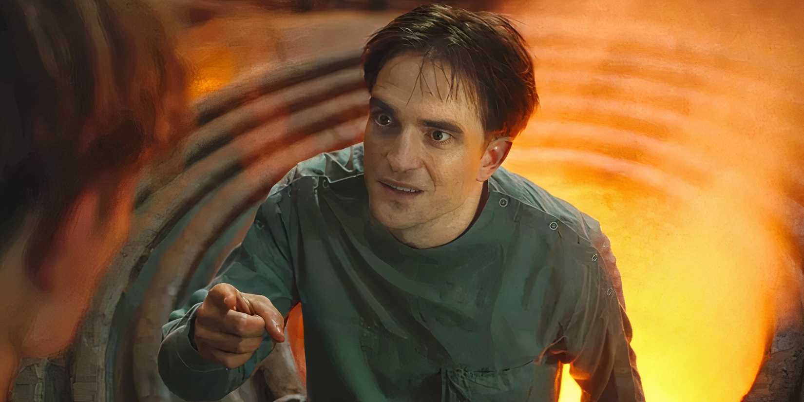 Robert Pattinson pointing up at himself in Mickey 17