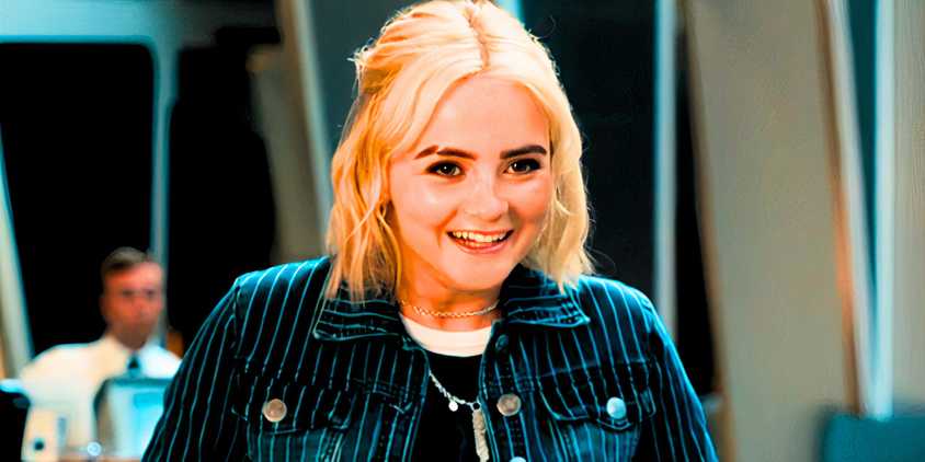 Millie Gibson smiling as Ruby Sunday in Doctor Who