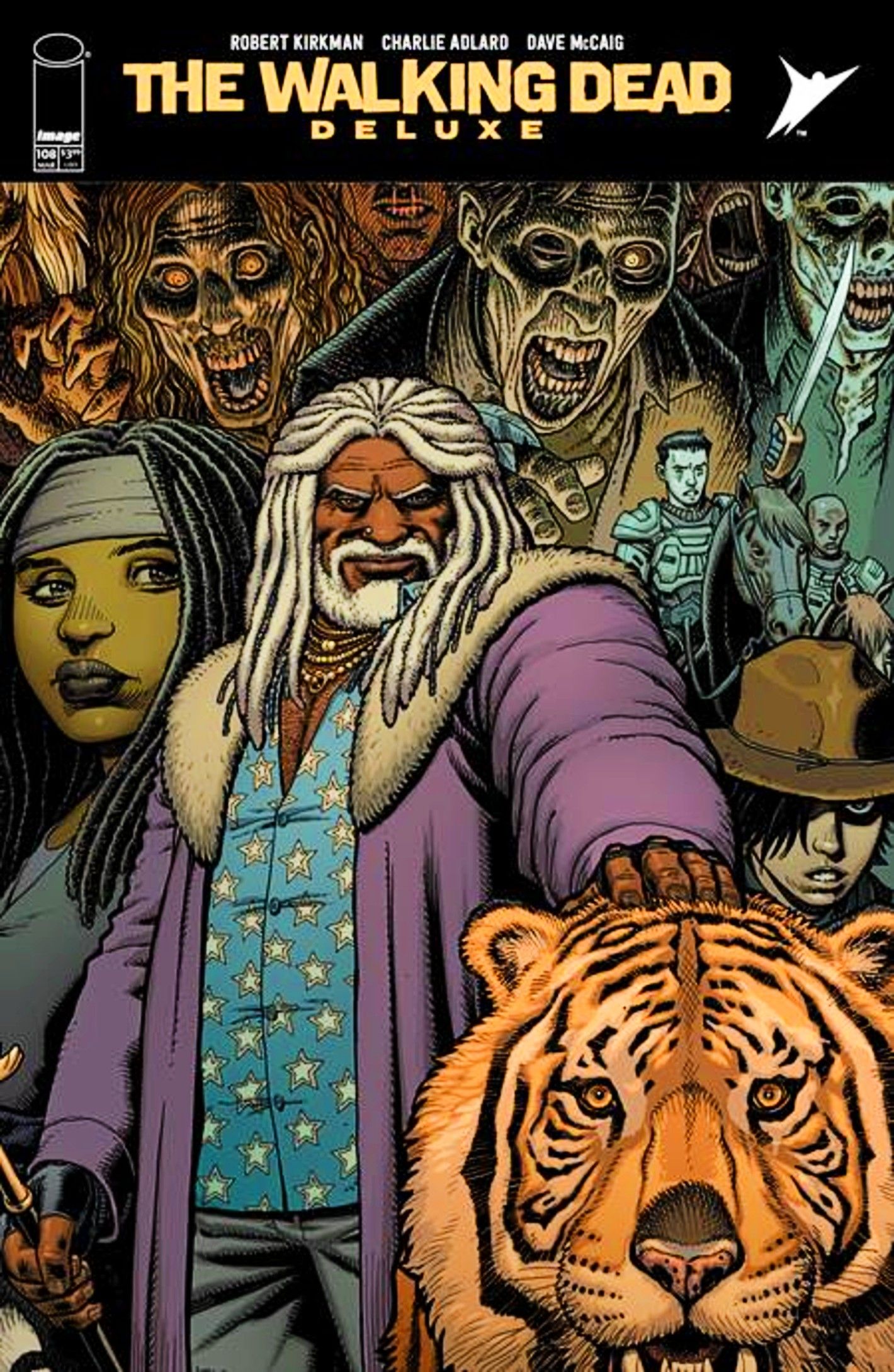 Walking Dead Deluxe #108 cover, Ezekial and Shiva standing with Michonne, Carl, and other characters as zombies loom