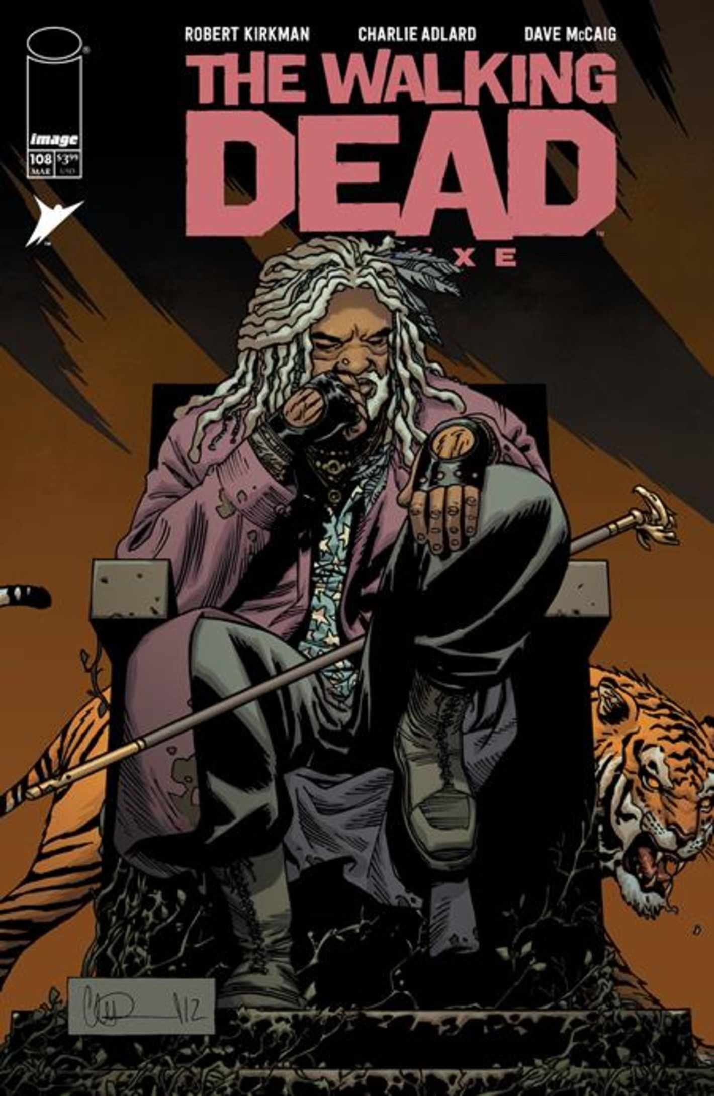 Walking Dead Deluxe #108 cover featuring Ezekial sitting on a stone throne