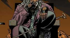 Walking Dead Deluxe #108 cover featuring Ezekial sitting on a stone throne