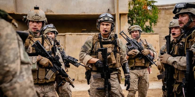 Charles Melton as Jake surrounded by his platoon in Warfare
