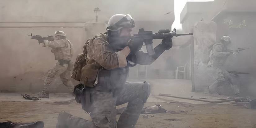 Three Navy SEALS aiming their guns in different directions in Warfare