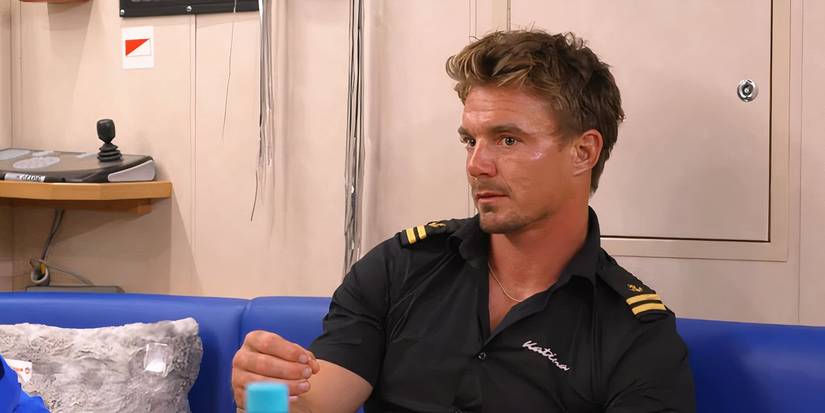 Wihan du Toit sitting in the galley on Below Deck looking incredulous