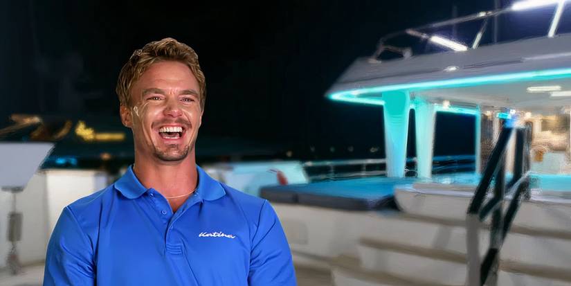 Wihan du Toit from Below Deck Down Under laughing on top deck in blue shirt