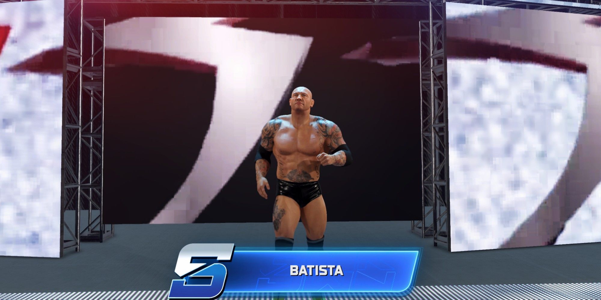 WWE 2K25 Batista walking down ramp as his name displays on screen.
