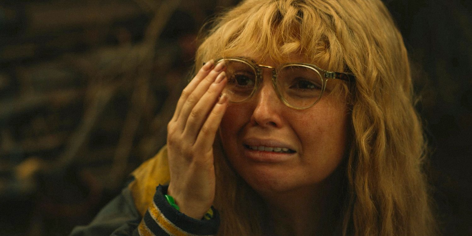 Teenage Misty (Samantha Hanratty) crying and adjusting her glasses in Yellowjackets season 3 episode 5