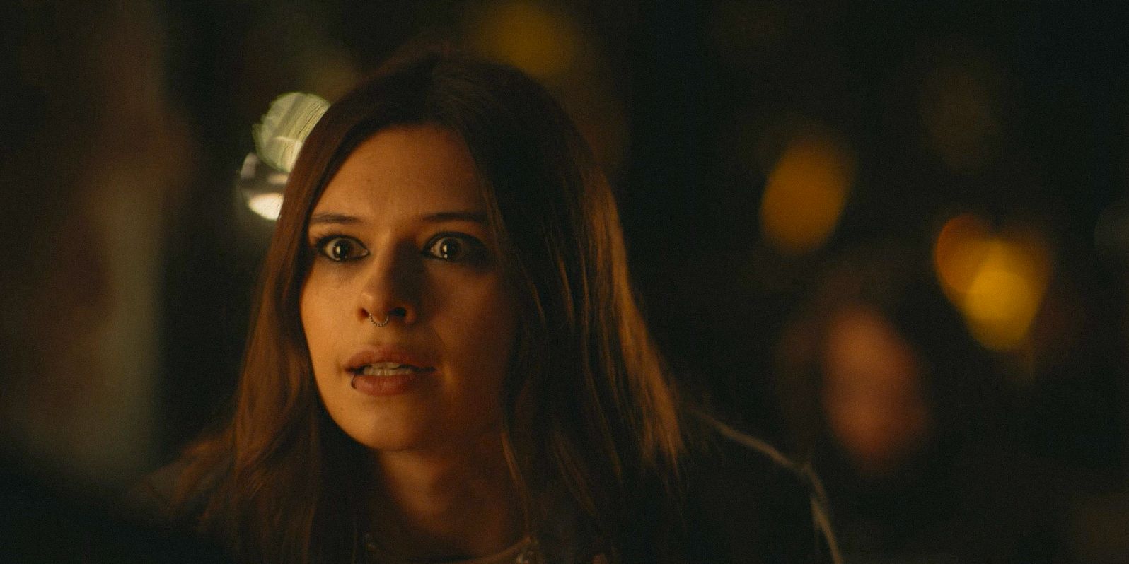 Lisa (Nicole Maines) looking shocked in Yellowjackets Season 3 Ep 6