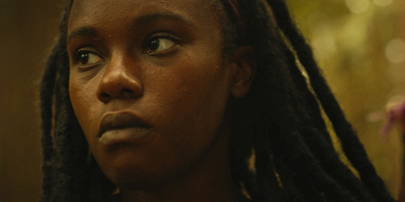 Close up of Teen Akilah (Nia Sondaya) in Yellowjackets Season 3 Episode 8