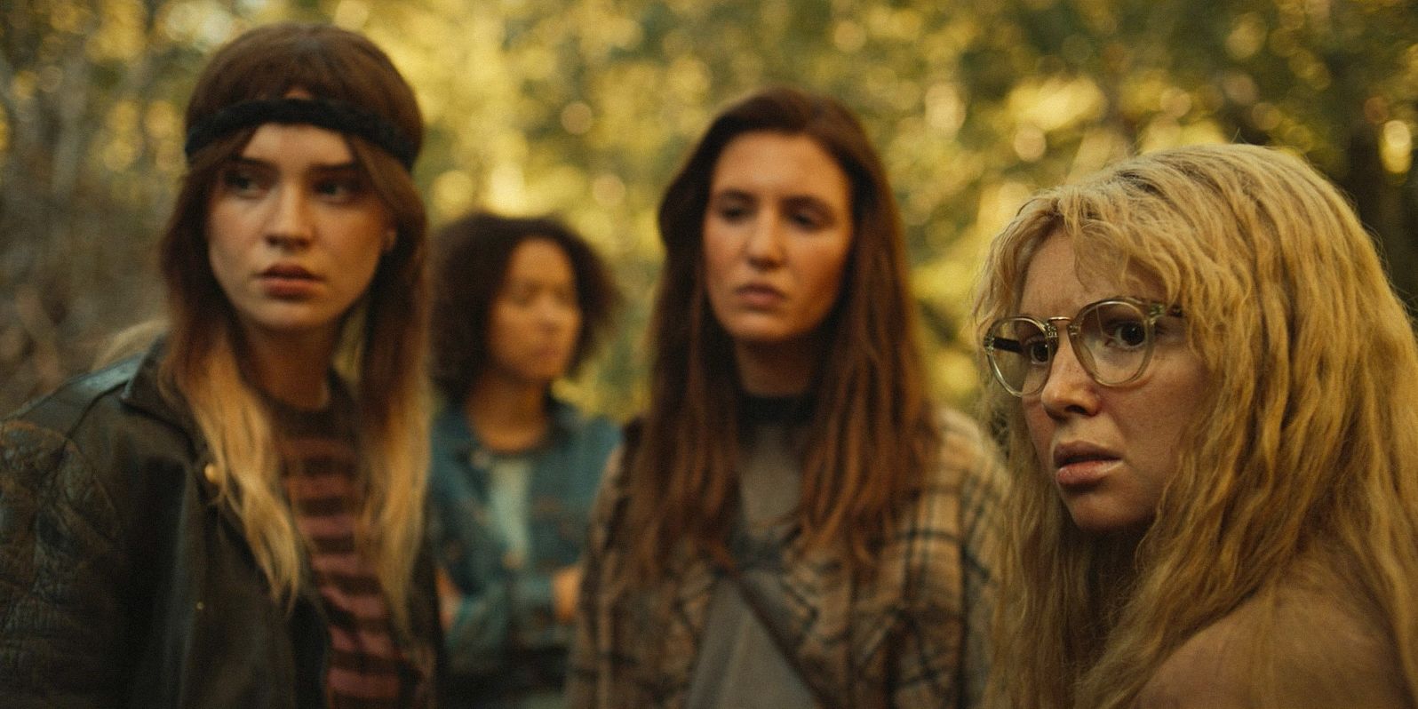 Natalie (Sophie Thatcher), Teen Shauna (Sophie Nélisse) and Teen Misty (Samantha Hanratty) looking incredulous in Yellowjackets Season 3 Episode 8