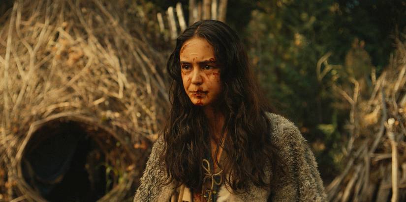 Teen Lottie (Courtney Eaton) with her face stained with blood in Yellowjackets Season 3 Episode 8