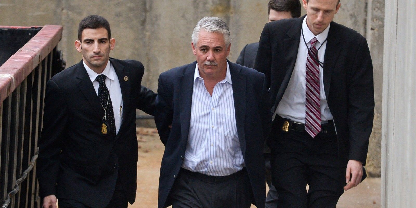James Burke being led away by officers